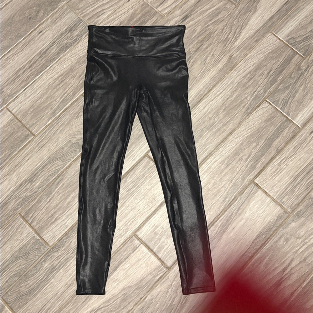 - Spanx Faux Leather Leggings in Metallic Black Medium